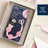 Pink pacifier clip with packaging in a box, suitable for gifting.