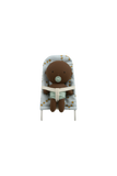 A small brown teddy bear plush toy with a pacifier, seated in a light blue patterned high chair with white straps, isolated on a solid black background.