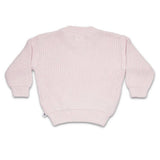 Pink knitted cardigan on a white background