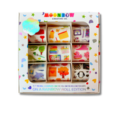 Box of colorful stationery items with 'Moonbow Creative Co.' branding on a white background.