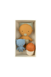 Set of baby toys including a yellow face, blue elephant, and orange teapot in a box on a white background