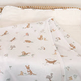 Baby crib sheet with animal pattern on a white background