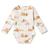 Baby onesie with bear and tree pattern on a white background