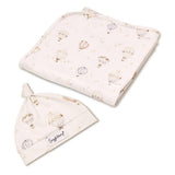 Baby hat and blanket set with hot air balloon pattern on a white background