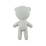 A minimalist white bear-shaped figure with a smooth matte finish, standing against a solid white background.