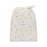 An off-white drawstring storage bag with a gold western-themed print of stars, horseshoes, and boots, featuring a central white label that reads 'kyedbaby'.