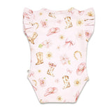 A light pink baby bodysuit with a western-themed print featuring cowboy boots, pink hats, flowers, and ribbons, shown flat against a white background.
