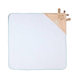 White baby towel with wooden toy on a white background