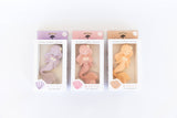 Three packages of Mermaid Mavee rubber toys on a white background