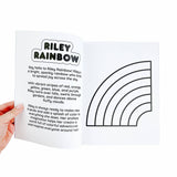 Hand holding a card with a black and white rainbow illustration and text.