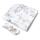 Floral-patterned baby blanket and hat set on a white background