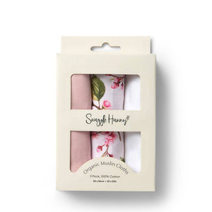 Pack of Snuggle Hunny organic muslin cloths with floral design on a white background