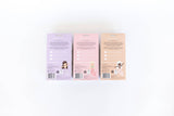 Three small boxes with different colored covers on a white background
