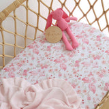 Snuggle Hunny Flamingos Organic Bassinet Sheet and Change Pad Cover featuring a playful flamingo print for newborn baby bedding and nursery styling.