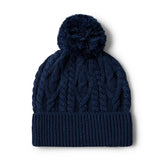 Blue knitted beanie with a pom-pom on a white background