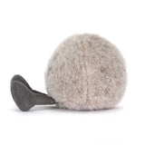 Fluffy gray ball with ribbed texture on a white background