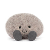 Plush toy sloth on a white background