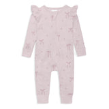 Pink baby onesie with bow pattern on a white background