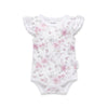 Floral-patterned baby bodysuit on a white background