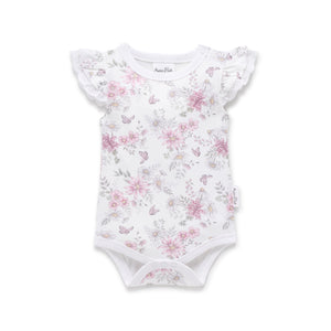Floral-patterned baby bodysuit on a white background