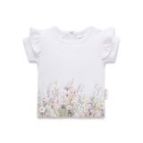 White t-shirt with floral design on a white background