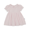 Pink dress with ruffled sleeves on a white background