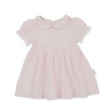 Pink dress with ruffled sleeves on a white background