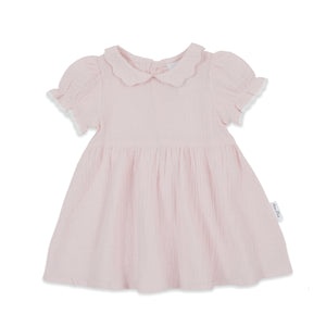 Pink dress with ruffled sleeves on a white background