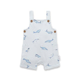 Baby romper with whale pattern on a white background