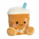 Plush toy resembling a brown drink with whipped cream and a blue straw on a white background