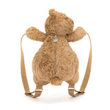 Brown teddy bear backpack with a visible zipper on a white background