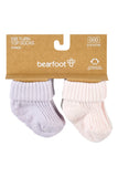A 4-pack of Bearfoot rib turn top socks in light lavender and pale pink, displayed on their brown cardboard packaging against a white background.