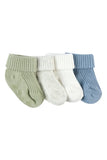 Three pairs of ribbed knit baby socks in sage green, white, and dusty blue, arranged side-by-side on a plain white background.