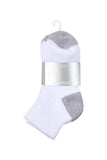 A pair of white low-cut socks with gray heels, toes, and soles, packaged with a clear plastic hanger and a silver paper band labeled 'barfoot'.