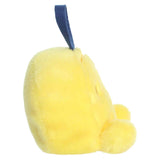 Yellow plush toy with a blue strap on a white background