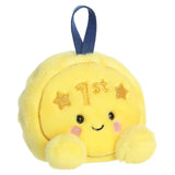 Yellow plush toy with a smiley face, '1st' text, and stars on a white background