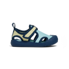 Children's sandal with blue and beige design on a white background