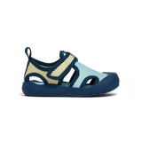 Children's sandal with blue and beige design on a white background