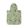 Green hooded poncho with tropical pattern on a white background