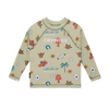 Children's long-sleeve shirt with colorful patterns on a beige background, featuring the brand 'CROW LION'.