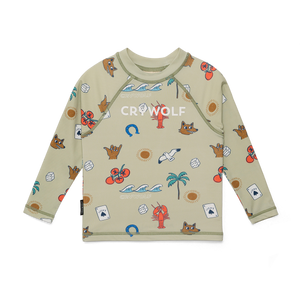 Children's long-sleeve shirt with colorful patterns on a beige background, featuring the brand 'CROW LION'.