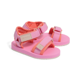 Pink and coral sandals with 'Kani Wolf' branding on a white background