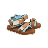 Pair of brown and blue sandals on a white background