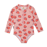 Pink children's swimsuit with strawberry pattern on a white background