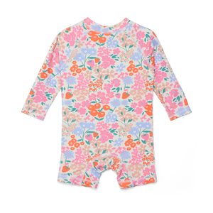 Floral patterned baby romper on a white background