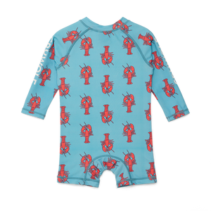 Children's blue swimsuit with red lobster pattern on a white background