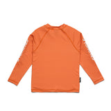 An orange long-sleeve athletic top with white vertical text printed down both sleeves, displayed flat against a solid white background.