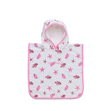 A white hooded baby poncho featuring a pink and red starfish and shell pattern, with pink trim and a pink inner lining, shown on a plain white background.