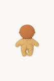 A small plush baby doll viewed from the back, featuring a smooth matte terracotta-orange head and a yellow-and-white gingham patterned body, set against a solid off-white background.