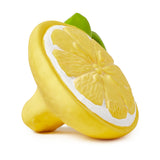 Yellow lemon-shaped object with white accent on a white background